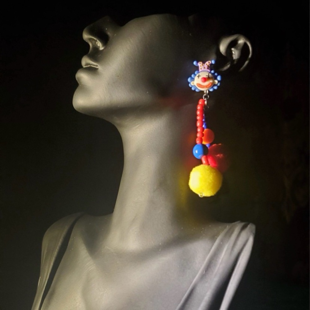 Vibrant Pom Pom Earrings with Clown Design